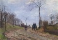 Carro en una carretera rural en las afueras de Louveciennes 1872 Camille Pissarro